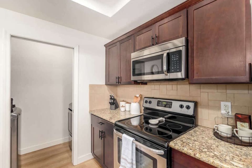 Kitchen with modern appliances, perfect for cooking your favorite meals.