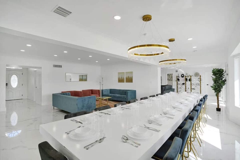 The Grand hall with an oversized dining table and open-concept living.