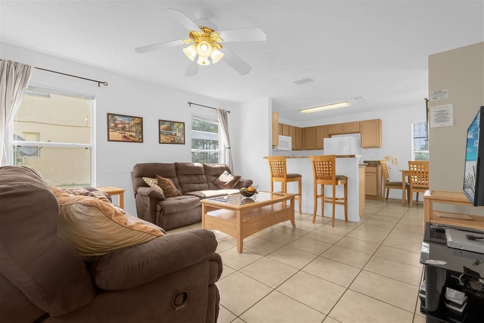 Living Room with TV and Breakfast Bar that Seats 2 People