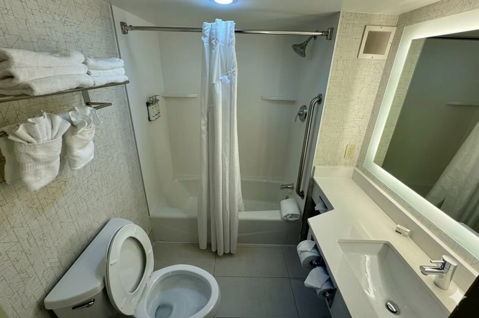 Feel refreshed in a clean, well-stocked bathroom space.