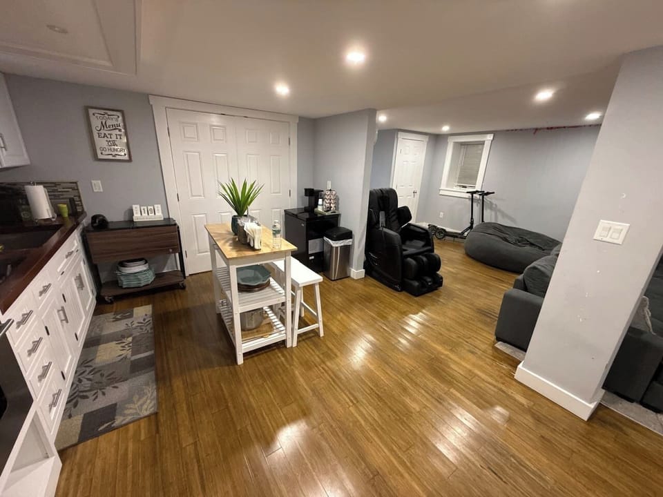 Lower level kitchen (left) & living room (right)