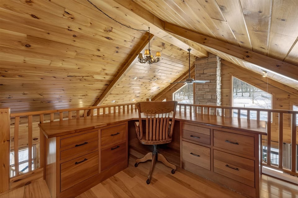Hallway with wood-paneled walls