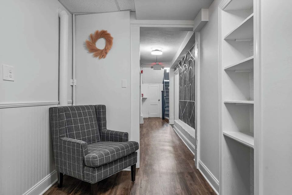  Ground-floor community lounge hallway. Your perfect spot to unwind before heading out.