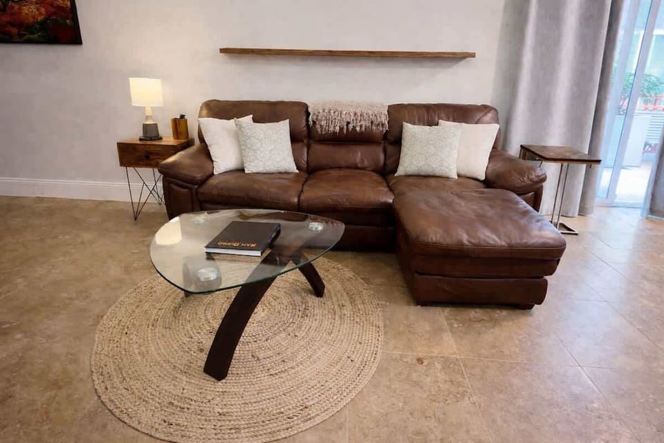 A comfortable and cozy couch while you're in the heart of Little Italy San Diego.