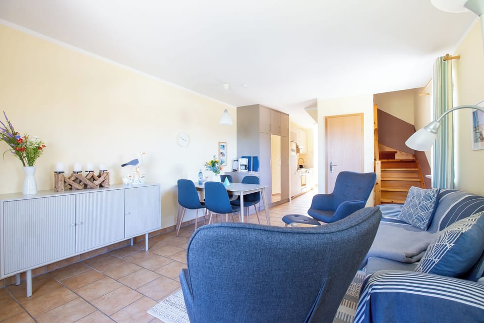 Living Room with Sofa and Dining Table