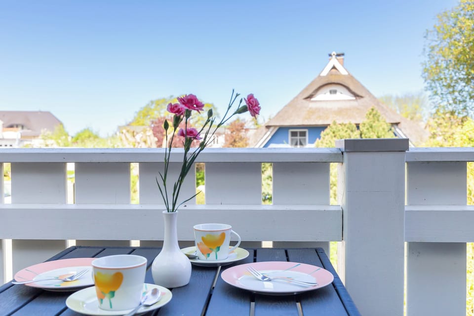 Terrace with Table and Flowers