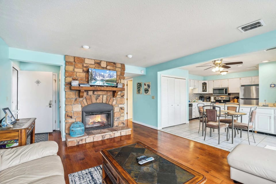 Curl up in the breezy living room & stream your favorites on the smart TV​