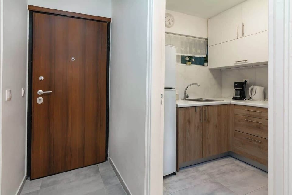 Secure entrance door with a modern lock system for peace of mind during your stay. The property offers both comfort and security, ensuring guests feel safe and relaxed throughout their visit