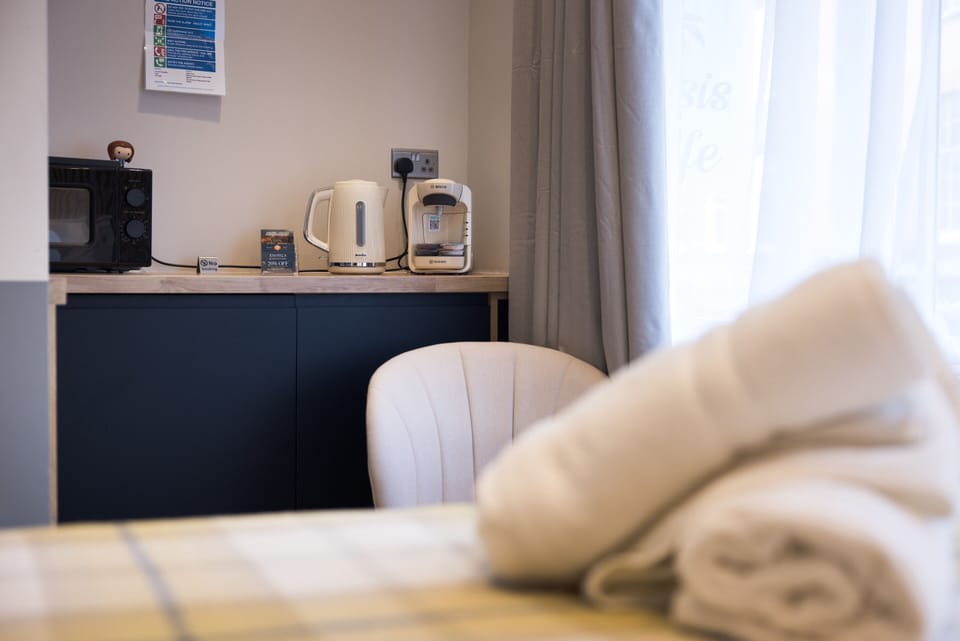 Contemporary studio featuring fully equipped kitchen facilities