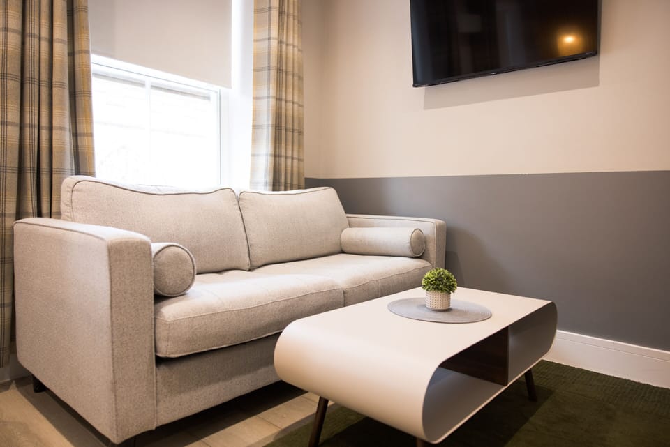 Comfortable double sofa bed for relaxing stays.