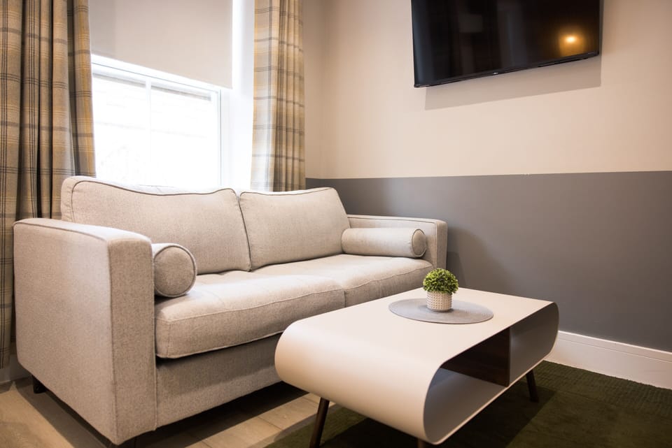 Comfortable double sofa bed for relaxing stays.