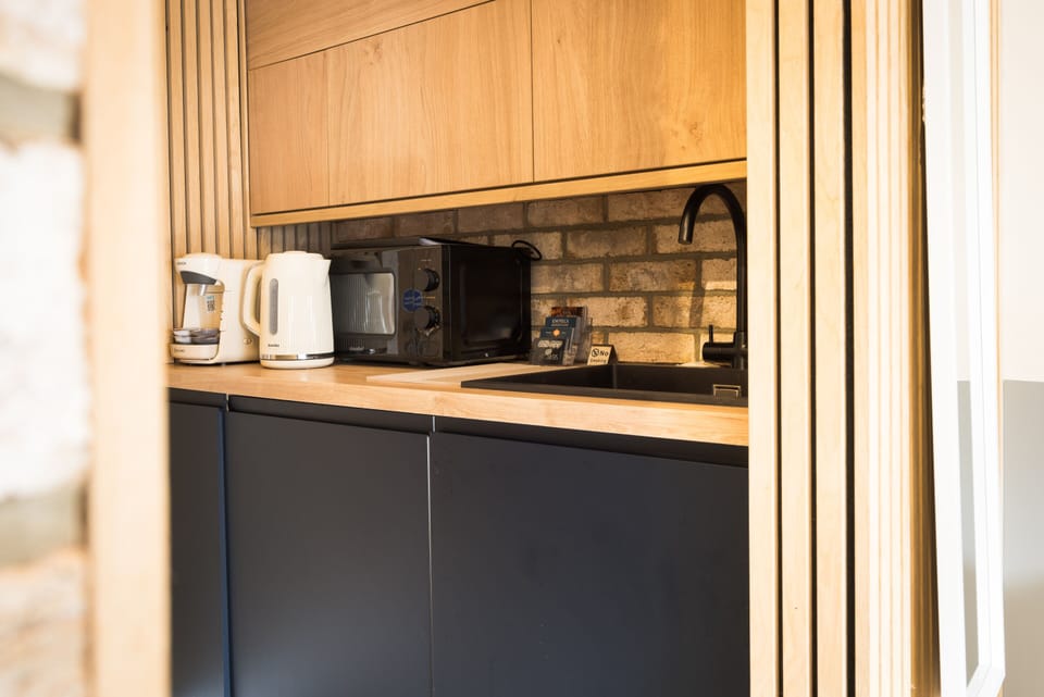 Kettle, coffee machine and microwave available for your convenience.