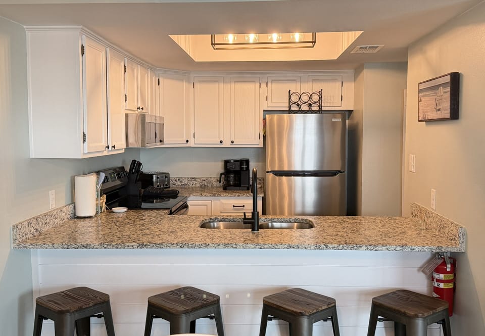 Kitchen with ample counter space and updated essentials.