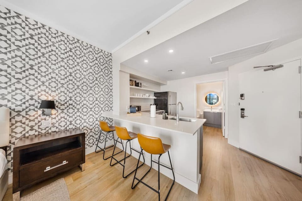 Countertop seating with 3 comfortable chairs.