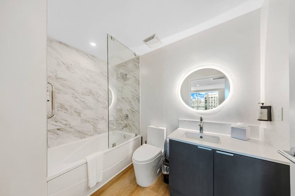 Full bathroom with soak-in tub.