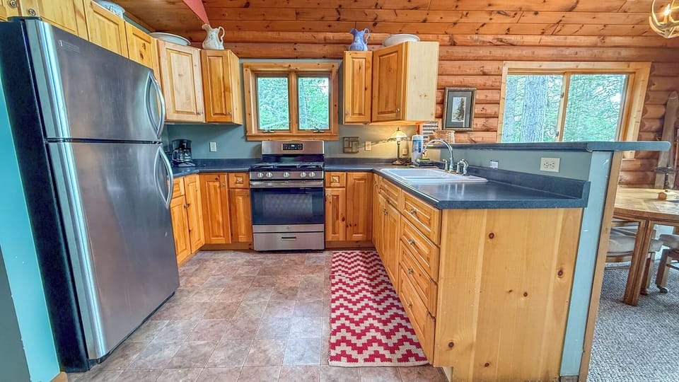 Kitchen with stainless steel appliances.