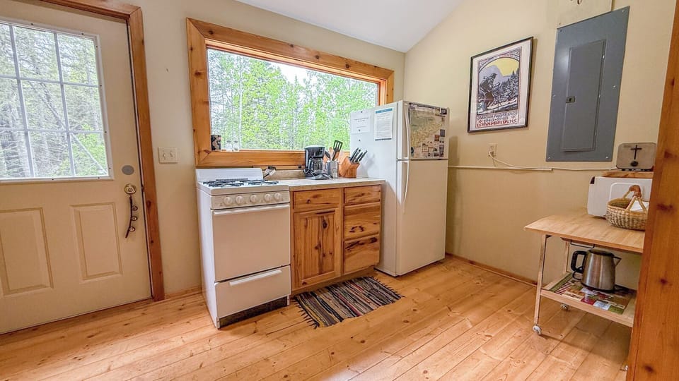 The quaint kitchen may not be filled with every amenity, but it has what you will need to enjoy a meal of freshly caught Pike Lake fish!