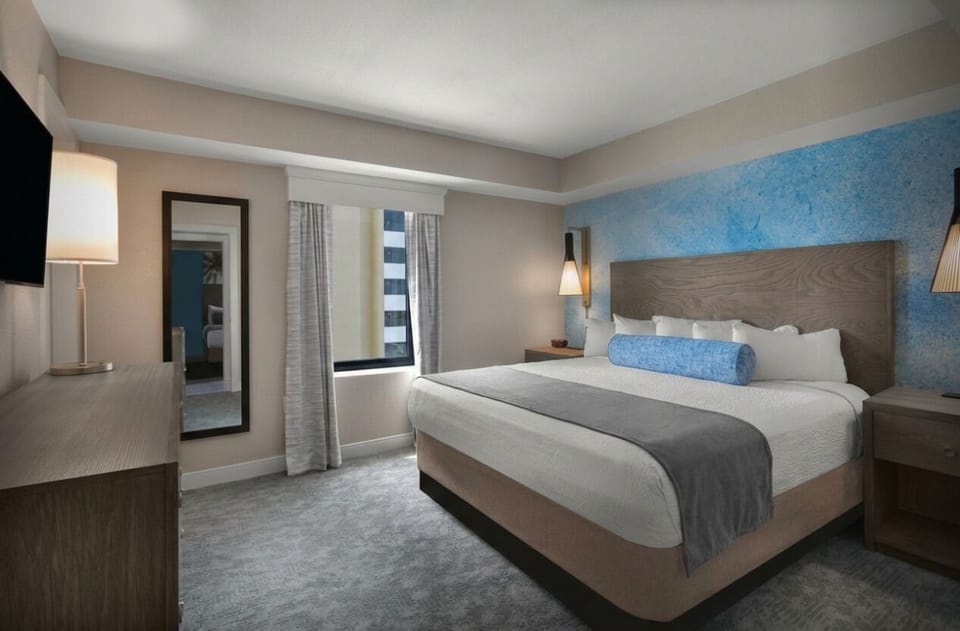 Sink into a serene king bed for deep, restful sleep.