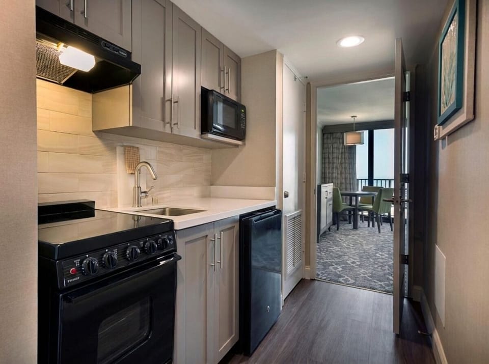 Whip up easy meals in a sleek, space-smart kitchenette.