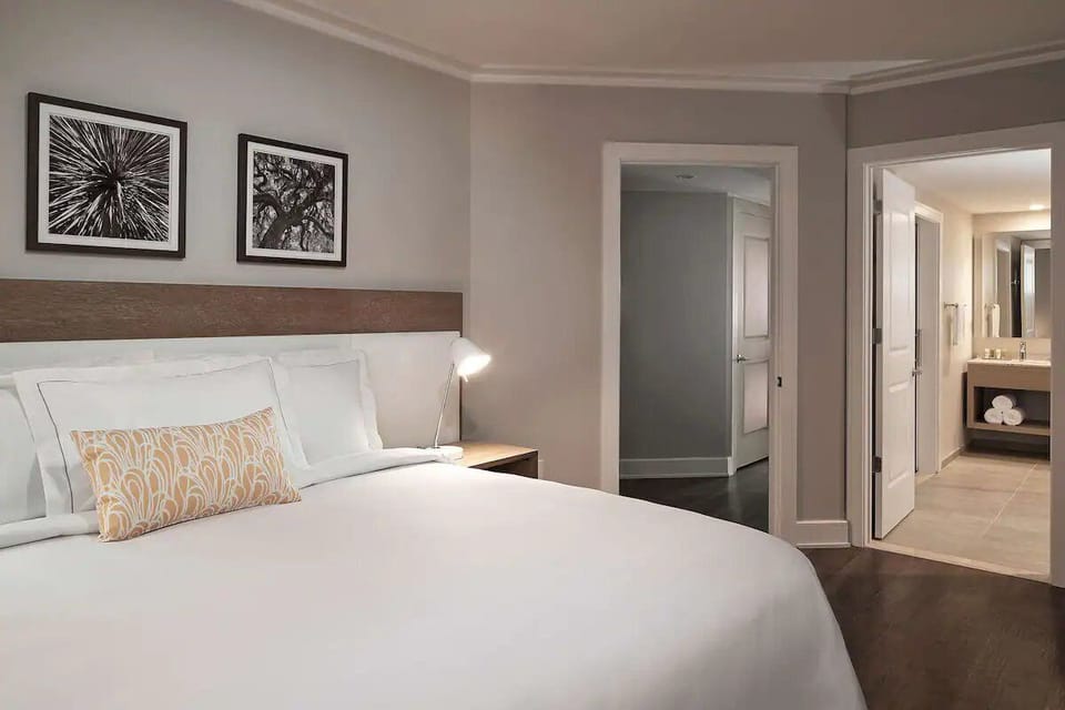 Stretch out in a tranquil room with warm, evening lighting.