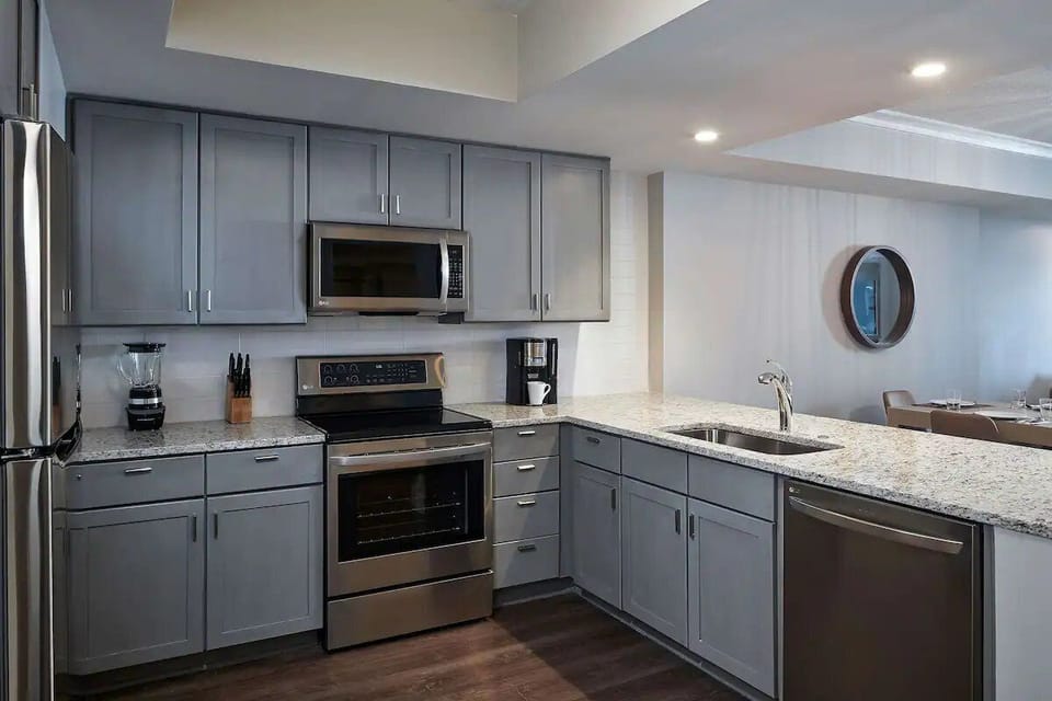 Cook together in a sleek kitchen with full-size appliances.