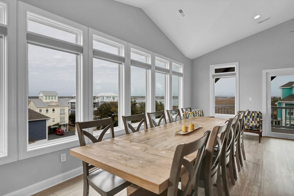 Gather, laugh, and dine together at this stunning table made for 10.