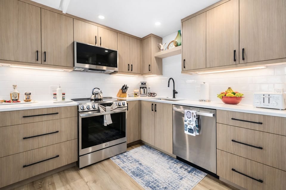 A fully equipped, modern kitchen designed for effortless meals and cozy nights in