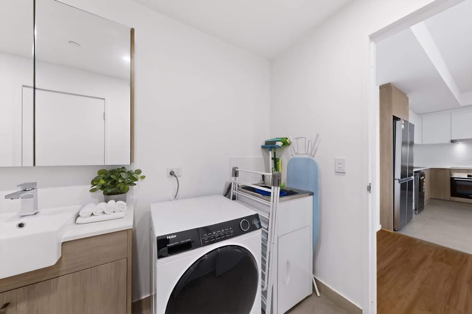 Second bathroom with laundry