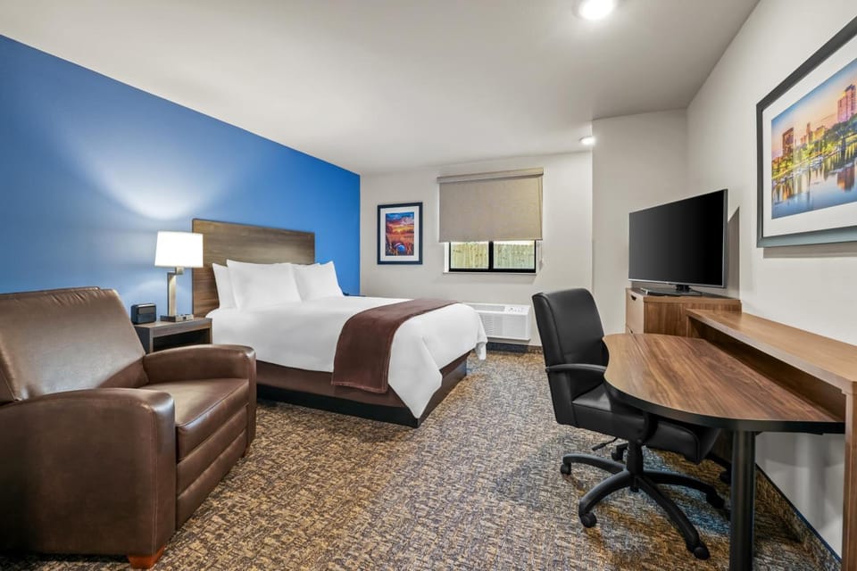 Stretch out in a spacious king room with lounge chair.