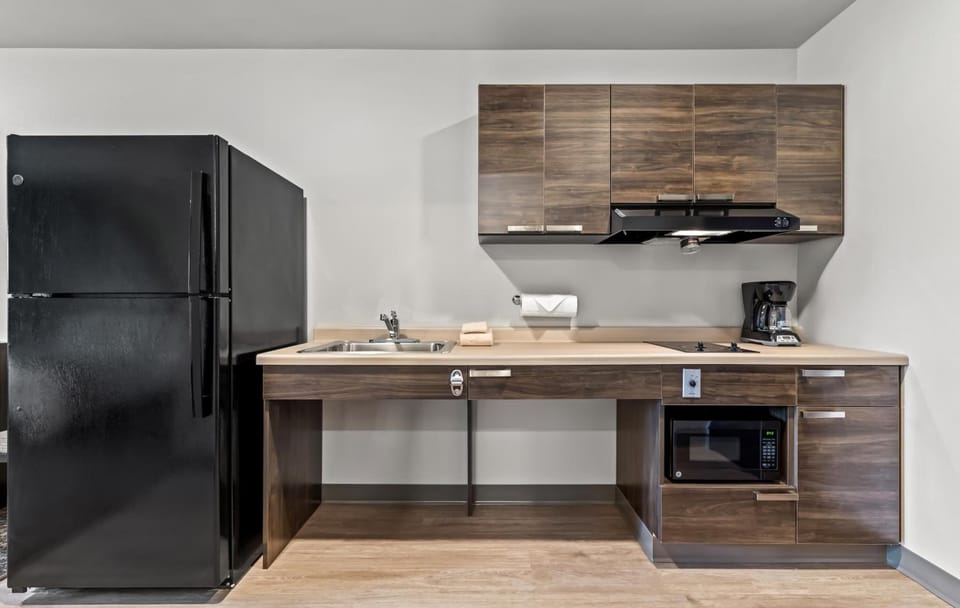 Cook up easy meals with full fridge and microwave.