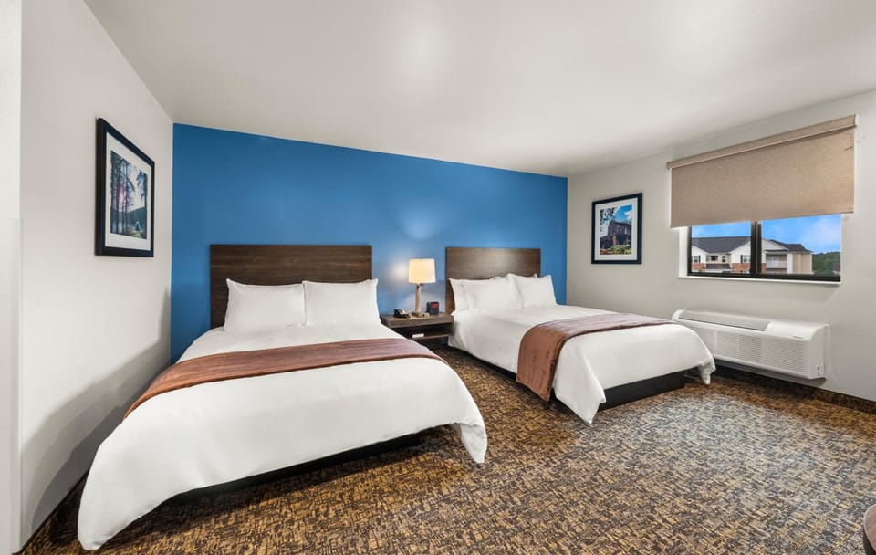 Stretch out and relax in a bright room with two beds.