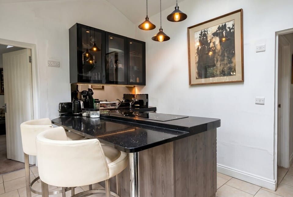 Pull up a bar stool at the kitchen island for morning coffee or a relaxed meal.