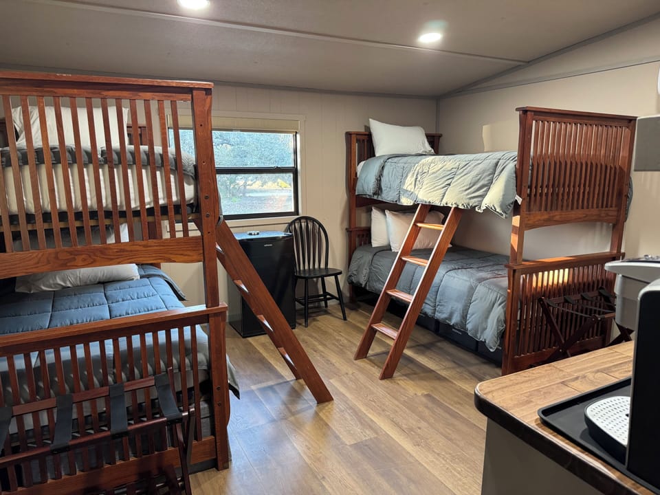 First bunkhouse bedroom with double bunk beds and private bath.