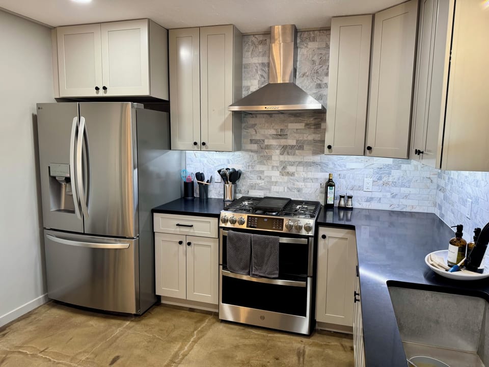 Double oven with gave stove.