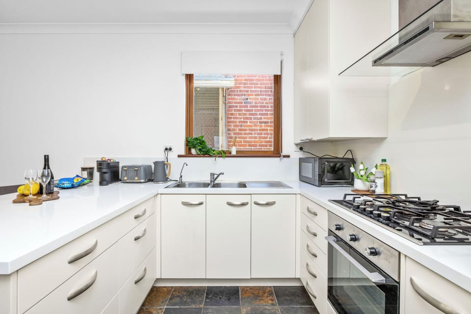 A bright, fully equipped kitchen with everything you need.