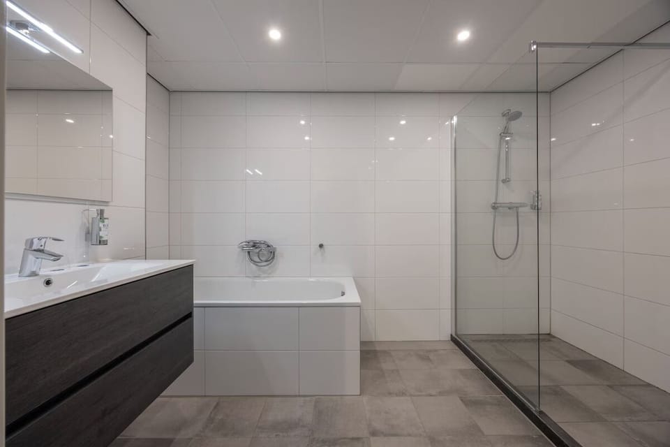 Soak or rinse off in a spotless bath-and-shower combo.