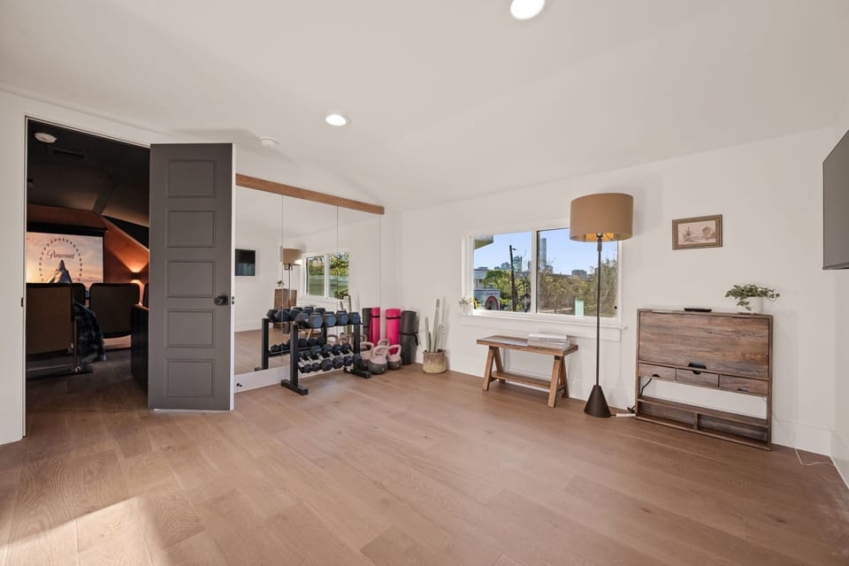 Versatile flex space with workout area and open layout