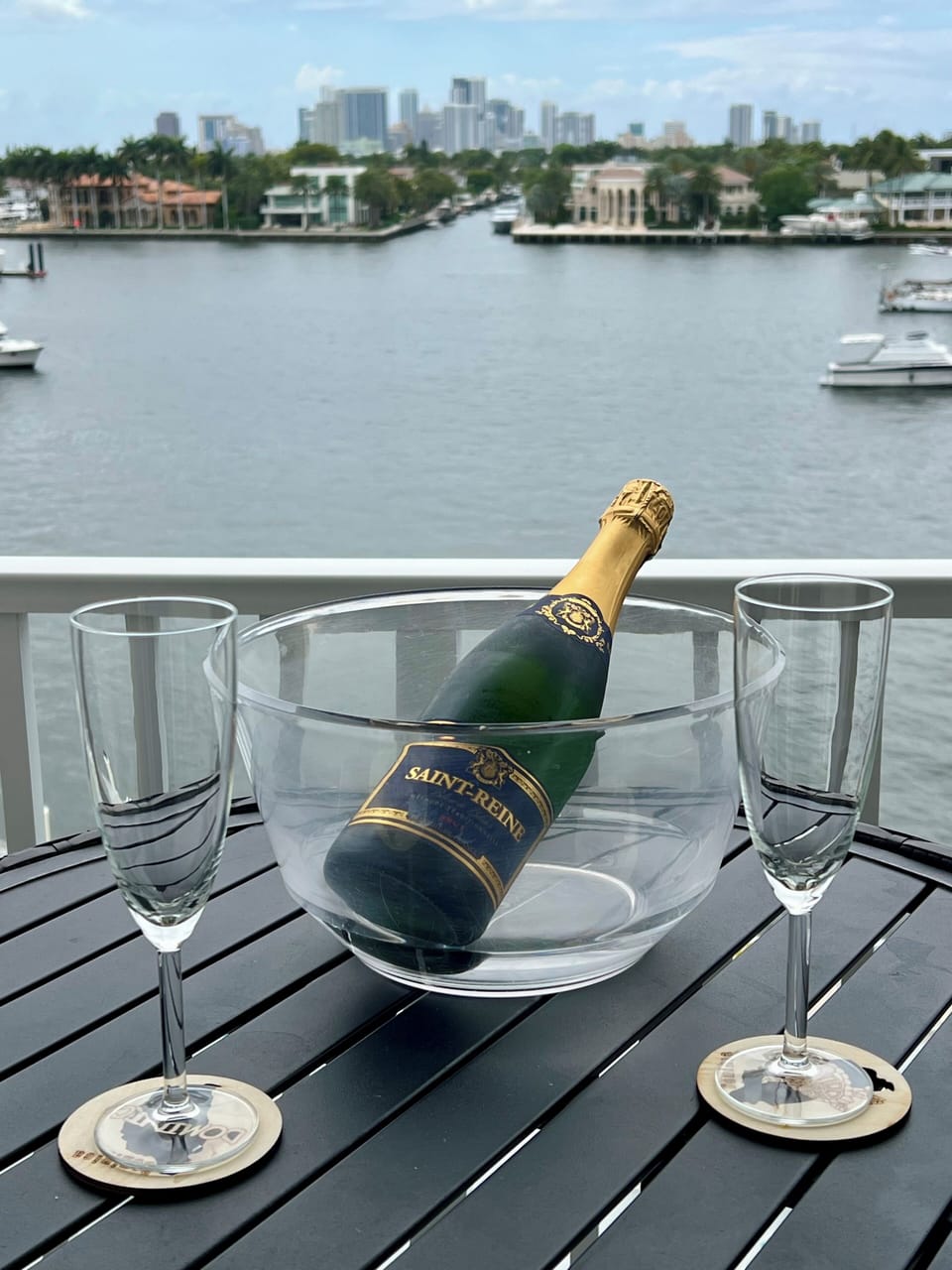 Drinks on the balcony. Champagne glasses but not the bottle included :)