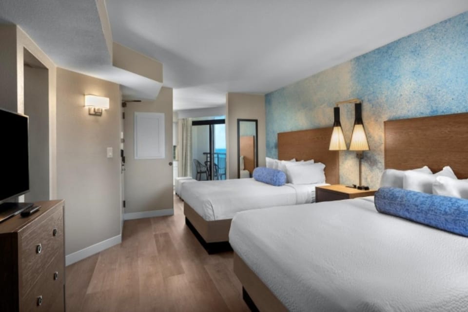 Unwind into crisp beds and drift off near ocean views.