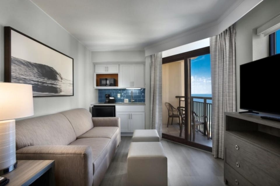 Stretch out in the lounge, then step onto the balcony.