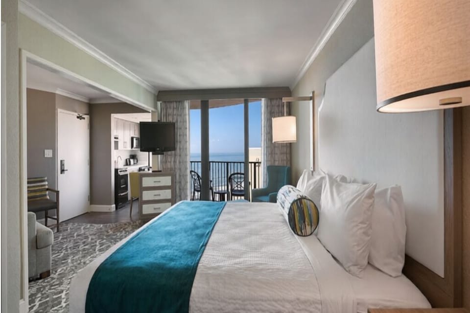 Wake up to sunrise light spilling in from balcony doors.