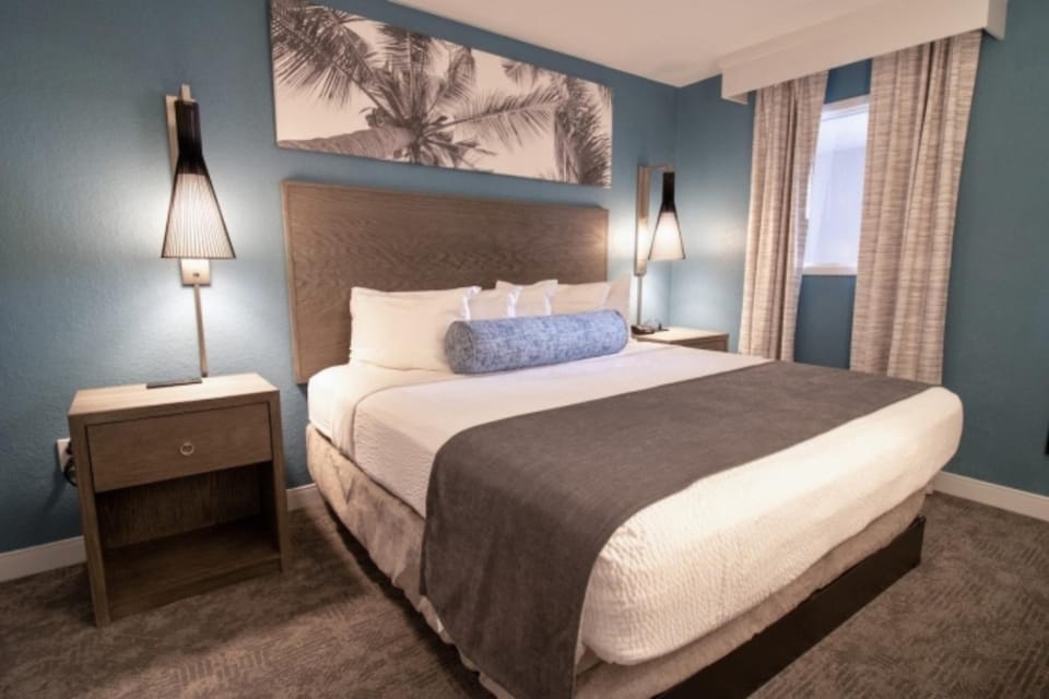 Drift off comfortably in a serene room with soft coastal tones.
