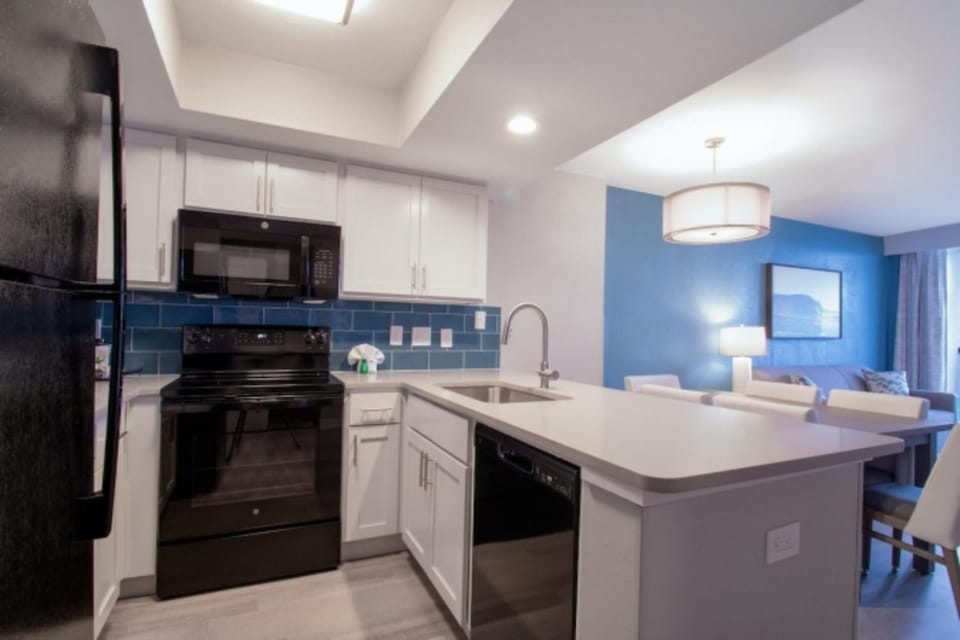 Cook easy meals in a bright, modern open kitchen.