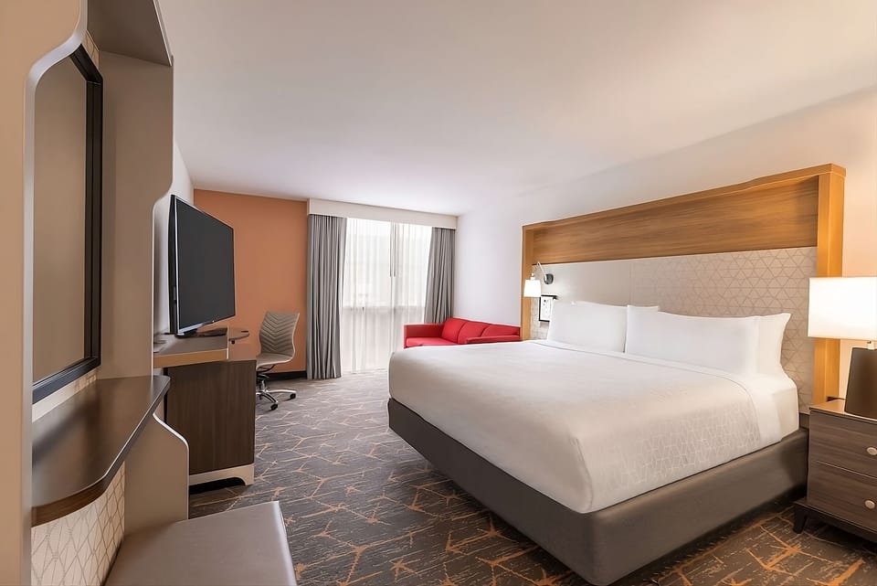 Relax on the sofa, then drift off in a plush bed.
