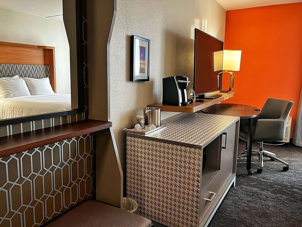 Sip morning coffee while planning the day at your in-room station.