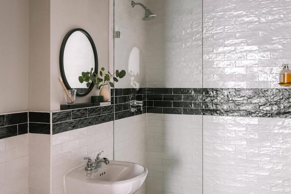 Refresh in a bright tiled bath with a roomy shower.