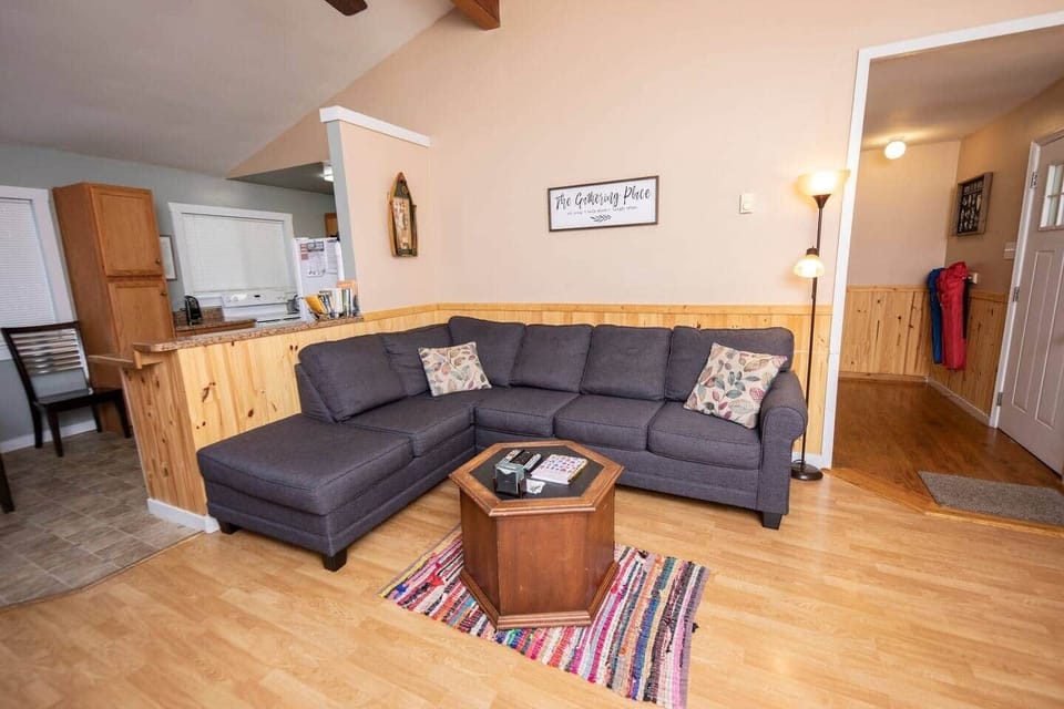 Spacious living room where one can unwind after a day of adventure