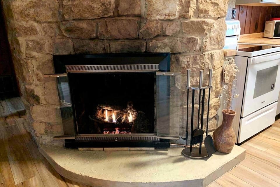 Large stone gas fireplace for romantic / cozy evenings 