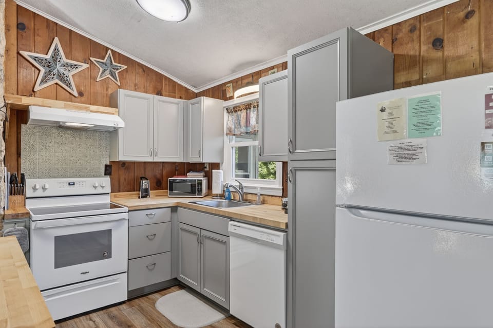 Prepare breakfast or family dinners with ease in the fully equipped kitchen.