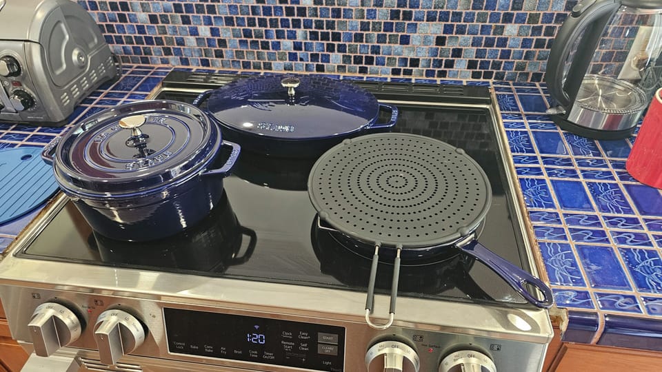 gourmet kitchen, with top quality pots and pans
